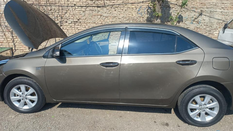 toyota-corolla-altis-grande-2015-big-2